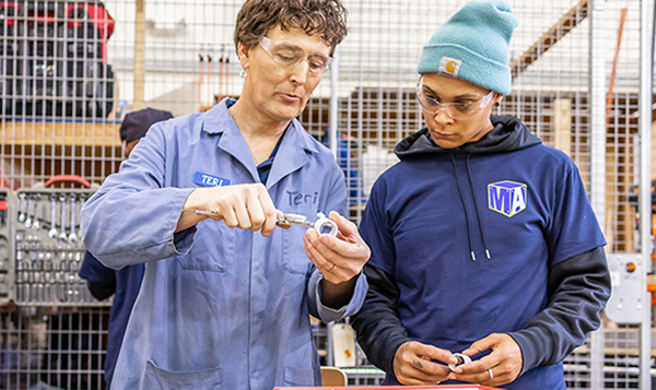 Industrial manufacturing program student and faculty at South Seattle Georgetown campus