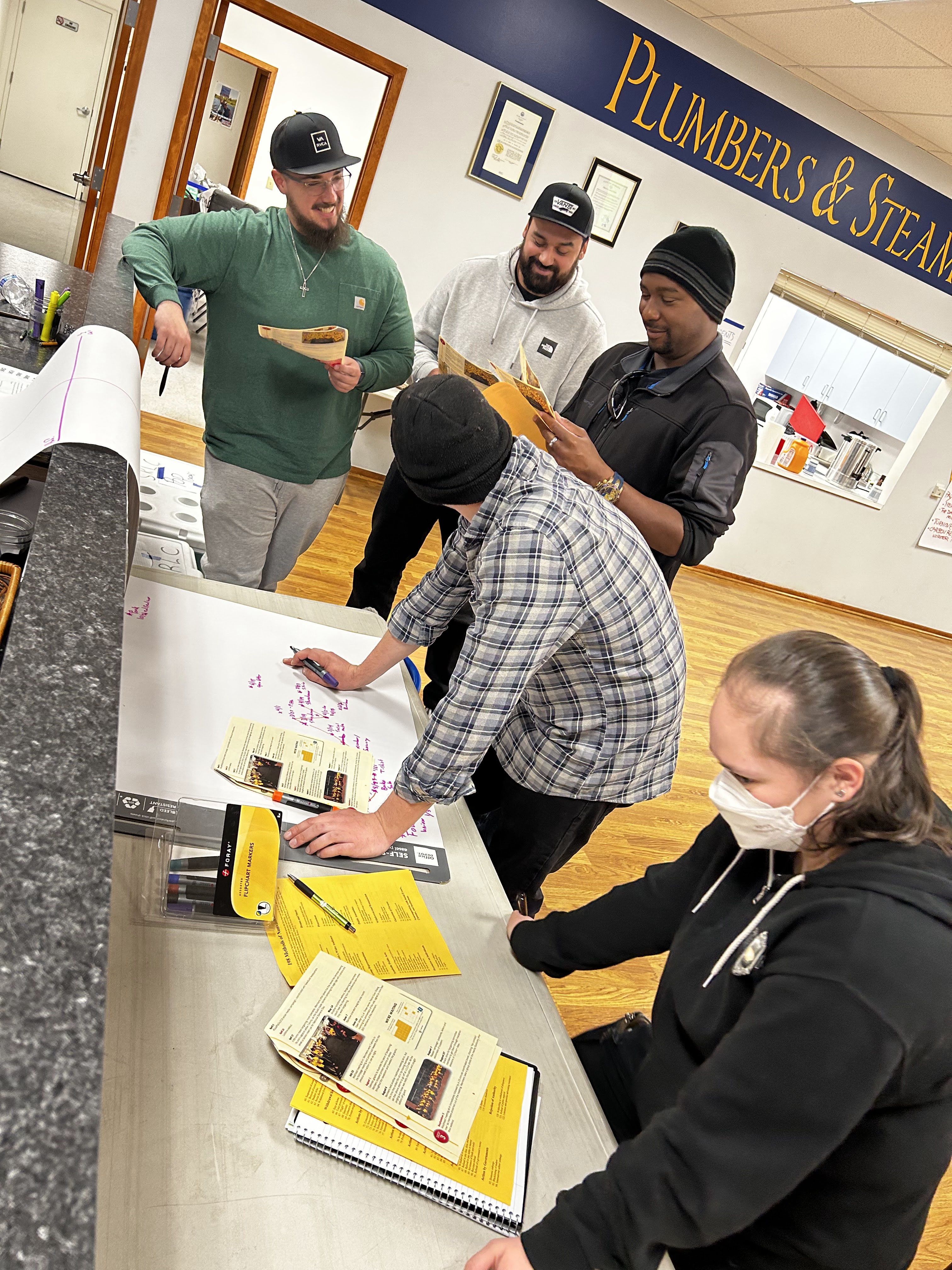 Class participants working on a project